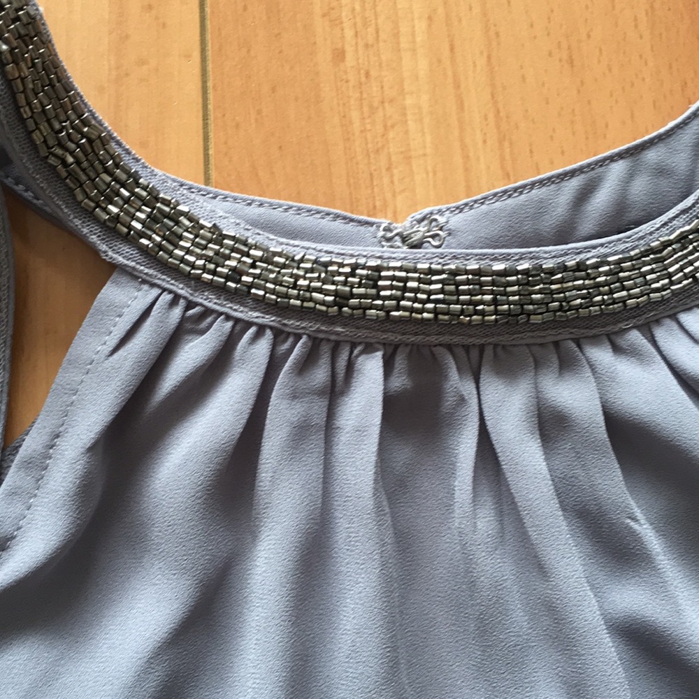 Pretty Express top with silver beading